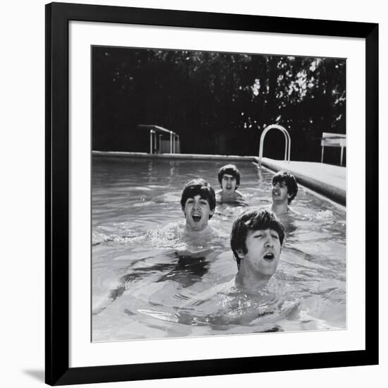 Paul McCartney, George Harrison, John Lennon and Ringo Starr Taking a Dip in a Swimming Pool-null-Framed Photographic Print