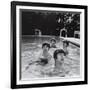 Paul McCartney, George Harrison, John Lennon and Ringo Starr Taking a Dip in a Swimming Pool-null-Framed Photographic Print