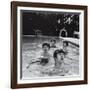 Paul McCartney, George Harrison, John Lennon and Ringo Starr Taking a Dip in a Swimming Pool-null-Framed Photographic Print