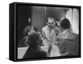 Paul Newman Talking to His Wife Joanne Woodward While Getting Dressed-Gordon Parks-Framed Stretched Canvas