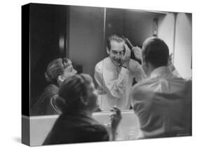 Paul Newman Talking to His Wife Joanne Woodward While Getting Dressed-Gordon Parks-Stretched Canvas