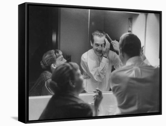 Paul Newman Talking to His Wife Joanne Woodward While Getting Dressed-Gordon Parks-Framed Stretched Canvas