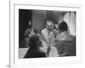 Paul Newman Talking to His Wife Joanne Woodward While Getting Dressed-Gordon Parks-Framed Premium Photographic Print