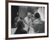 Paul Newman Talking to His Wife Joanne Woodward While Getting Dressed-Gordon Parks-Framed Premium Photographic Print