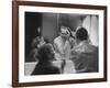 Paul Newman Talking to His Wife Joanne Woodward While Getting Dressed-Gordon Parks-Framed Premium Photographic Print