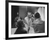Paul Newman Talking to His Wife Joanne Woodward While Getting Dressed-Gordon Parks-Framed Premium Photographic Print