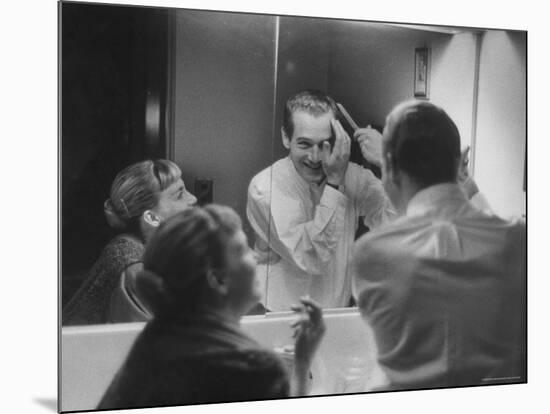 Paul Newman Talking to His Wife Joanne Woodward While Getting Dressed-Gordon Parks-Mounted Premium Photographic Print