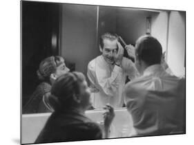 Paul Newman Talking to His Wife Joanne Woodward While Getting Dressed-Gordon Parks-Mounted Premium Photographic Print