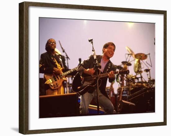 Paul Simon Performing with Band Musicians-null-Framed Premium Photographic Print