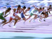 Runners Legs Splashing Through Water Jump of Track and Field Steeplechase Race, Sydney, Australia-Paul Sutton-Photographic Print