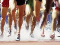 Runners Legs Splashing Through Water Jump of Track and Field Steeplechase Race, Sydney, Australia-Paul Sutton-Photographic Print