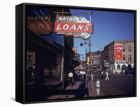 Pawnbroker Shop Sign Prominent Along a Street in Memphis-null-Framed Stretched Canvas
