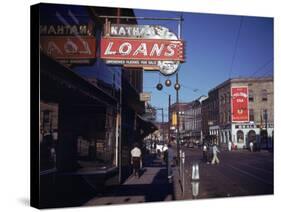 Pawnbroker Shop Sign Prominent Along a Street in Memphis-null-Stretched Canvas