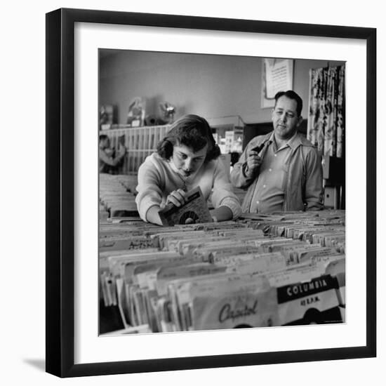 Pay in Trade Taken by High School Music Store Worker Margaret High, Spending Salary on Records-Nina Leen-Framed Photographic Print