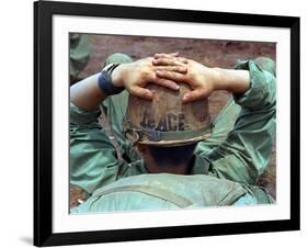 Peace Helmet-Associated Press-Framed Photographic Print