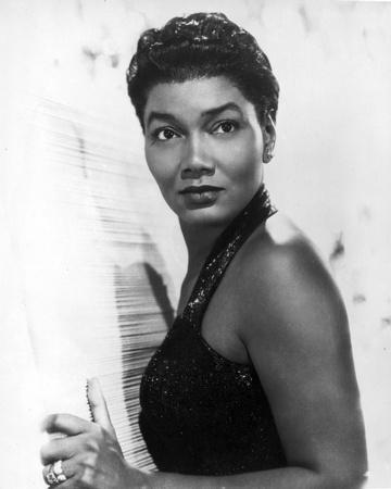 https://imgc.allpostersimages.com/img/posters/pearl-bailey-posed-in-black-tank-top-portrait-with-white-background_u-L-Q1180BS0.jpg?artPerspective=n