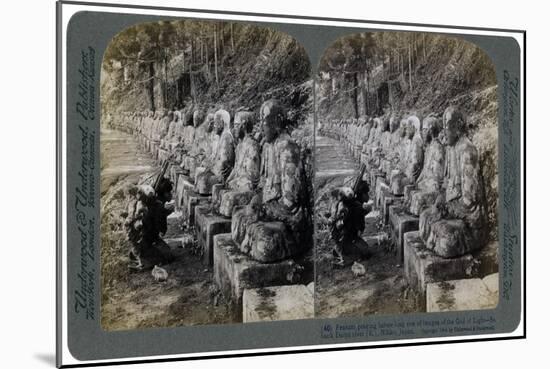 Peasant Praying before a Row of Statues of the God of Light, Daiya River, Nikko, Japan, 1904-Underwood & Underwood-Mounted Giclee Print