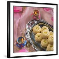 'Peda' an Indian Sweet Made from Condensed Milk. Arranged along with Traditional Lights.-satel-Framed Photographic Print