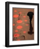 Pedestrian Makes His Way in New York's Times Square in the Rain-null-Framed Photographic Print