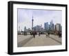 Pedestrians and Tourists on the Bund, the Futuristic Skyline of Pudong across the Huangpu River Bey-Amanda Hall-Framed Photographic Print