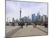 Pedestrians and Tourists on the Bund, the Futuristic Skyline of Pudong across the Huangpu River Bey-Amanda Hall-Mounted Photographic Print