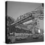 Pedestrians Cross Virginia Street as the Arch That Proclaims Reno: the Biggest Little City-null-Stretched Canvas