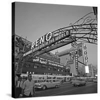 Pedestrians Cross Virginia Street as the Arch That Proclaims Reno: the Biggest Little City-null-Stretched Canvas