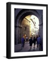 Pedestrians Entering Archway, Lucca, Italy-Merrill Images-Framed Photographic Print