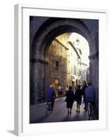 Pedestrians Entering Archway, Lucca, Italy-Merrill Images-Framed Photographic Print