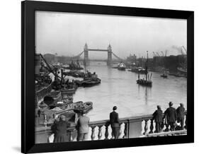 Pedestrians on London Bridge Watch Boats and Barges Being Unloaded-null-Framed Photographic Print