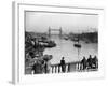 Pedestrians on London Bridge Watch Boats and Barges Being Unloaded-null-Framed Photographic Print