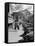 Pedestrians Walking Along Main Street in Resort Town with Cascade Mountain in the Background-Andreas Feininger-Framed Stretched Canvas