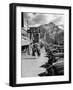 Pedestrians Walking Along Main Street in Resort Town with Cascade Mountain in the Background-Andreas Feininger-Framed Photographic Print