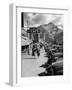 Pedestrians Walking Along Main Street in Resort Town with Cascade Mountain in the Background-Andreas Feininger-Framed Photographic Print