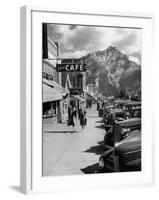 Pedestrians Walking Along Main Street in Resort Town with Cascade Mountain in the Background-Andreas Feininger-Framed Photographic Print