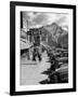 Pedestrians Walking Along Main Street in Resort Town with Cascade Mountain in the Background-Andreas Feininger-Framed Photographic Print