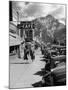 Pedestrians Walking Along Main Street in Resort Town with Cascade Mountain in the Background-Andreas Feininger-Mounted Photographic Print