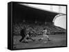Pee Wee Reese Bats for the Brooklyn Dodgers During a Dodgers-Braves Game at Miami Stadium-null-Framed Stretched Canvas