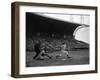 Pee Wee Reese Bats for the Brooklyn Dodgers During a Dodgers-Braves Game at Miami Stadium-null-Framed Photographic Print