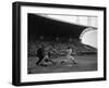 Pee Wee Reese Bats for the Brooklyn Dodgers During a Dodgers-Braves Game at Miami Stadium-null-Framed Photographic Print