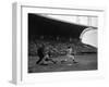 Pee Wee Reese Bats for the Brooklyn Dodgers During a Dodgers-Braves Game at Miami Stadium-null-Framed Photographic Print