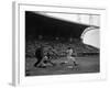 Pee Wee Reese Bats for the Brooklyn Dodgers During a Dodgers-Braves Game at Miami Stadium-null-Framed Photographic Print
