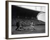 Pee Wee Reese Bats for the Brooklyn Dodgers During a Dodgers-Braves Game at Miami Stadium-null-Framed Photographic Print