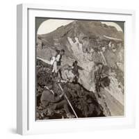 Peering from the Lava Encrusted Rim Down into Mount Fuji's (Fujiyama) Crater, Japan, 1904-Underwood & Underwood-Framed Photographic Print