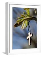 Pendant with cross on a young green chestnut leaf at springtime-null-Framed Giclee Print