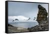Penguins below dramatic rock formations, Half Moon Bay, South Sheltand Islands, Antarctica, Polar R-Michael Runkel-Framed Stretched Canvas