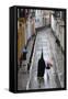 Penitents During Semana Santa (Holy Week) Along Rainy Street, Seville, Andalucia, Spain, Europe-Stuart Black-Framed Stretched Canvas