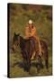 Pensive Cowboy on His Horse-DLILLC-Stretched Canvas