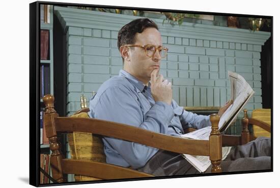 Pensive Man Reading Newspaper in Living Room-William P. Gottlieb-Framed Stretched Canvas