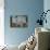 Pensive Man Reading Newspaper in Living Room-William P. Gottlieb-Photographic Print displayed on a wall